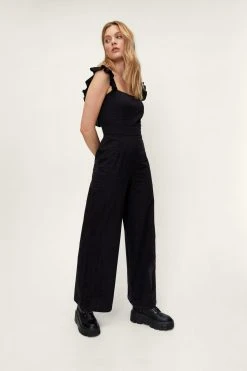 Dobby Texture Ruffle Wide Leg Jumpsuit -Nasty Gal Sales Store womens black dobby texture ruffle wide leg jumpsuit 2