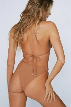 Shell Trim Triple Strap Bikini Bottoms 8 Shell Trim Triple Strap Bikini Bottoms -Nasty Gal Sales Store womens rust shell trim triple strap bikini bottoms 2