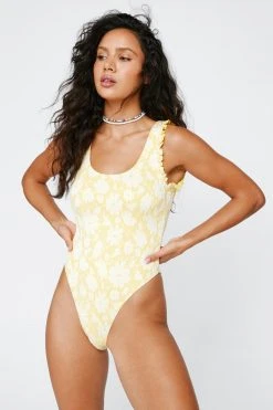 Textured Floral Ruffle Tie Back Swimsuit 14 Textured Floral Ruffle Tie Back Swimsuit -Nasty Gal Sales Store womens yellow textured floral ruffle tie back swimsuit 2